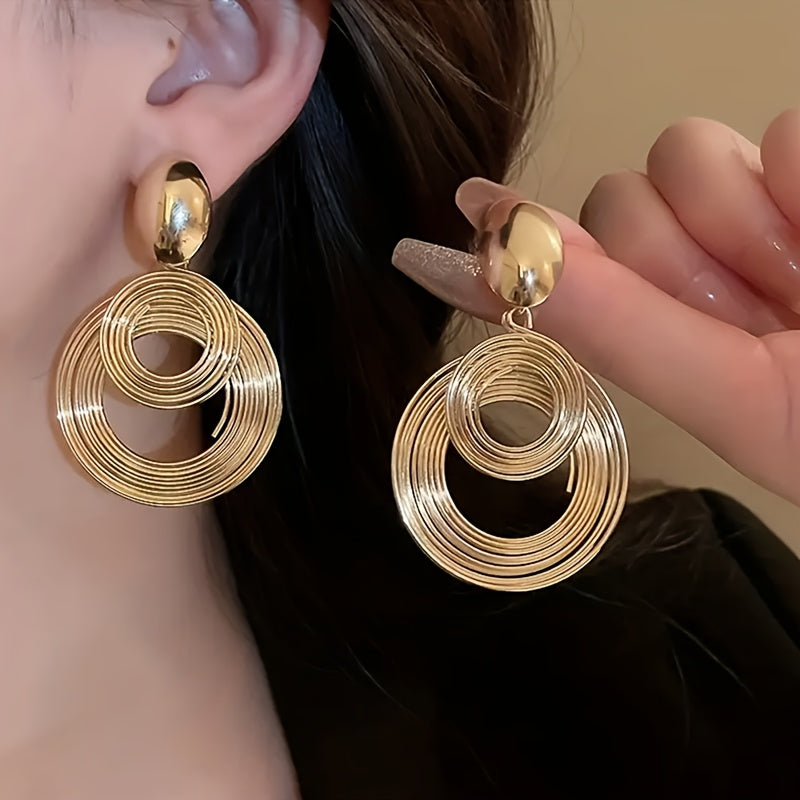 Charm de bobina dorada